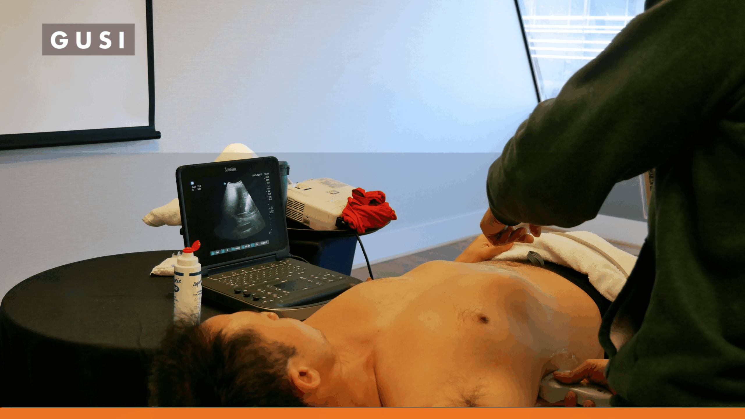Participants practice lung ultrasound for tuberculosis during an in-person training course led by the Global Ultrasound Institute.